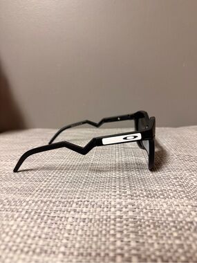 Oakley Black Sunglasses with White Logo Accent